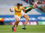 25 June 2023; Patrick McBride of Antrim in action against Conor Gray of Meath during the Tailteann Cup Semi Final match between Antrim and Meath at Croke Park in Dublin. Photo by Michael P Ryan/Sportsfile