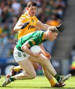 25 June 2023; Mathew Costello of Meath in action against Gerard Walsh of Antrim during the Tailteann Cup Semi Final match between Antrim and Meath at Croke Park in Dublin. Photo by Michael P Ryan/Sportsfile