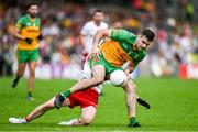 24 June 2023; Caolan McGonagle of Donegal in action against Peter Harte of Tyrone during the GAA Football All-Ireland Senior Championship Preliminary Quarter Final match between Donegal and Tyrone at MacCumhaill Park in Ballybofey, Donegal. Photo by Brendan Moran/Sportsfile