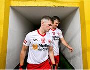 24 June 2023; Brothers Ruairi, left, and Darragh Canavan of Tyrone make their way onto the pitch before the GAA Football All-Ireland Senior Championship Preliminary Quarter Final match between Donegal and Tyrone at MacCumhaill Park in Ballybofey, Donegal. Photo by Brendan Moran/Sportsfile