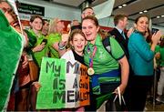 26 June 2023; Team Ireland's Lauren Campbell, a member of Palmerstown Wildcats Special Olympics Club, from Dublin 12, is welcomed by her daughter Ava, aged 9, at Dublin Airport on the team's return from the World Special Olympic Games in Berlin, Germany. Photo by Sam Barnes/Sportsfile