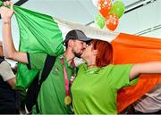 26 June 2023; Team Ireland's Samuel McCabe, a member of Carlow Special Olympics Club, from Athy, Kildare, and his girlfriend Paula Divalle pictured at Dublin Airport on the team's return from the World Special Olympic Games in Berlin, Germany. Photo by Sam Barnes/Sportsfile