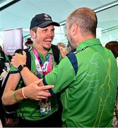 26 June 2023; Team Ireland's Timothy Morahan, a member of South Dublin Sports Club, from Dublin 6, and his coach Paddy Slattery, right, pictured at Dublin Airport on the team's return from the World Special Olympic Games in Berlin, Germany. Photo by Sam Barnes/Sportsfile