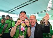 26 June 2023; Team Ireland's Timothy Morahan, a member of South Dublin Sports Club, from Dublin 6, with his father John Morahan, right, at Dublin Airport on the team's return from the World Special Olympic Games in Berlin, Germany. Photo by Sam Barnes/Sportsfile