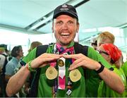 26 June 2023; Team Ireland's Timothy Morahan, a member of South Dublin Sports Club, from Dublin 6, pictured with his medals at Dublin Airport on the team's return from the World Special Olympic Games in Berlin, Germany. Photo by Sam Barnes/Sportsfile