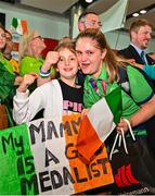 26 June 2023; Team Ireland's Lauren Campbell, a member of Palmerstown Wildcats Special Olympics Club, from Dublin 12, is welcomed by her daughter Ava, aged 9, at Dublin Airport on the team's return from the World Special Olympic Games in Berlin, Germany. Photo by Sam Barnes/Sportsfile