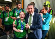 26 June 2023; Team Ireland's Déarbháile Savage, a member of Newry All Stars Special Olympics Club, from Mowhan, Armagh, is greeted by Matt English, CEO of Special Olympics Ireland at Dublin Airport on the team's return from the World Special Olympic Games in Berlin, Germany. Photo by Ray McManus/Sportsfile