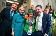 26 June 2023; Team Ireland's Breege Walsh, a member of Castlebar Special Olympics Club, from Claremorris, Mayo, is greeted by Matt English, CEO of Special Olympics Ireland, and Aer Lingus personell, Daniel Hurley, left, and Kelly Grant at Dublin Airport on the team's return from the World Special Olympic Games in Berlin, Germany. Photo by Ray McManus/Sportsfile