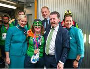 26 June 2023; Team Ireland's Breege Walsh, a member of Castlebar Special Olympics Club, from Claremorris, Mayo, is greeted by Matt English, CEO of Special Olympics Ireland, and Aer Lingus personell, Kelly Grant, left, and Paloma O'Reilly at Dublin Airport on the team's return from the World Special Olympic Games in Berlin, Germany. Photo by Ray McManus/Sportsfile