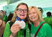 26 June 2023; Team Ireland's Fiona Brady, a member of Navan Arch Special Olympics Club, from Navan, Meath, and her coach Mary Davitt pictured at Dublin Airport on the team's return from the World Special Olympic Games in Berlin, Germany. Photo by Sam Barnes/Sportsfile