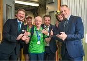 26 June 2023; Team Ireland's Martin Murray, a member of Rehab Castlebar, from Castlebar, Mayo, is greeted by Daniel Hurley, left, Senior Cabin Crew Aer Lingus, Matt English, CEO of Special Olympics Ireland, and Minister of State at Department of Tourism, Culture, Arts, Gaeltacht, Sport and Media Thomas Byrne TD at Dublin Airport on the team's return from the World Special Olympic Games in Berlin, Germany. Photo by Ray McManus/Sportsfile