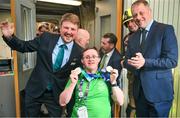 26 June 2023; Team Ireland's Sean Sammon, a member of Castlebar Special Olympics Club, from Castlebar, Mayo, is greeted by Daniel Hurley, left, Senior Cabin Crew Aer Lingus, Minister of State at Department of Tourism, Culture, Arts, Gaeltacht, Sport and Media Thomas Byrne TD at Dublin Airport on the team's return from the World Special Olympic Games in Berlin, Germany. Photo by Ray McManus/Sportsfile