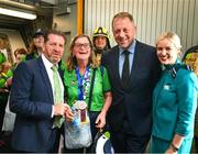 26 June 2023; Team Ireland's Fiona Brady, a member of Navan Arch Special Olympics Club, from Navan, Meath, is greeted by Kelly Grant, right, Senior Cabin Crew, Aer Lingus, Matt English, CEO of Special Olympics Ireland, and Minister of State at Department of Tourism, Culture, Arts, Gaeltacht, Sport and Media Thomas Byrne TD at Dublin Airport on the team's return from the World Special Olympic Games in Berlin, Germany. Photo by Ray McManus/Sportsfile