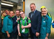 26 June 2023; Team Ireland's Jack Egan, a member of Navan Arch Club, from Navan, Meath, is greeted by Aer Lingus Cabin Crew, Paloma O'Reilly, left, and Kelly Grant, Matt English, CEO of Special Olympics Ireland and Minister of State at Department of Tourism, Culture, Arts, Gaeltacht, Sport and Media Thomas Byrne TD at Dublin Airport on the team's return from the World Special Olympic Games in Berlin, Germany. Photo by Ray McManus/Sportsfile