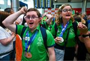 26 June 2023; Team Ireland's Mixed Double pairing of Sean Sammon, a member of Castlebar Special Olympics Club, from Castlebar, Mayo, and Fiona Brady, a member of Navan Arch Special Olympics Club, from Navan, Meath, pictured at Dublin Airport on the team's return from the World Special Olympic Games in Berlin, Germany. Photo by Ray McManus/Sportsfile