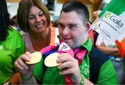 26 June 2023; Team Ireland's Eoin Daly, a member of KARE Academy Street Local Service, from Rathangan, Kildare, pictured at Dublin Airport on the team's return from the World Special Olympic Games in Berlin, Germany. Photo by Ray McManus/Sportsfile