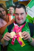 26 June 2023; Team Ireland's Eoin Daly, a member of KARE Academy Street Local Service, from Rathangan, Kildare, pictured at Dublin Airport on the team's return from the World Special Olympic Games in Berlin, Germany. Photo by Ray McManus/Sportsfile