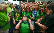 26 June 2023; Team Ireland's Sean Sammon, a member of Castlebar Special Olympics Club, from Castlebar, Mayo, pictured with team mates at Dublin Airport on the team's return from the World Special Olympic Games in Berlin, Germany. Photo by Ray McManus/Sportsfile