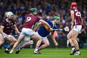 24 June 2023; Noel McGrath of Tipperary in action against Cathal Mannion of Galway during the GAA Hurling All-Ireland Senior Championship Quarter Final match between Galway and Tipperary at TUS Gaelic Grounds in Limerick. Photo by Piaras Ó Mídheach/Sportsfile