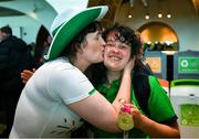 26 June 2023; Team Ireland's Louise Day, a member of Palmerstown Wildcats Special Olympics Club, from Drimnagh, Dublin is welcomed home by Steph Power at Dublin Airport on the team's return from the World Special Olympic Games in Berlin, Germany. Photo by Ray McManus/Sportsfile