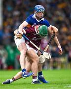 24 June 2023; Fintan Burke of Galway in action against Conor Bowe of Tipperary during the GAA Hurling All-Ireland Senior Championship Quarter Final match between Galway and Tipperary at TUS Gaelic Grounds in Limerick. Photo by Piaras Ó Mídheach/Sportsfile