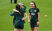 26 June 2023; Megan Connolly with Marissa Sheva and Ciara Grant, right, before a Republic of Ireland training session at UCD Bowl in Dublin. Photo by Brendan Moran/Sportsfile