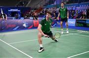 26 June 2023; Joshua Magee of Ireland in action against Greco Giovanni and David Salutt of Italy in the badminton Men's Doubles Group at the Jaskolka Arena during the European Games 2023 in Poland. Photo by Tyler Miller/Sportsfile