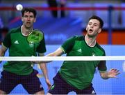 26 June 2023; Paul Reynolds of Ireland in action against Greco Giovanni and David Salutt of Italy in the badminton Men's Doubles Group at the Jaskolka Arena during the European Games 2023 in Poland. Photo by Tyler Miller/Sportsfile