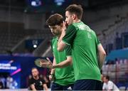 26 June 2023; Paul Reynolds of Ireland, right, issues instructions to teammate Joshua Magee in the badminton Men's Doubles Group against Greco Giovanni, and David Salutt of Italy at the Jaskolka Arena during the European Games 2023 in Poland. Photo by Tyler Miller/Sportsfile
