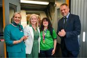 26 June 2023; Team Ireland's Louise Day, a member of Palmerstown Wildcats Special Olympics Club, from Drimnagh, Dublin pictured with Karen Coventry, Director of Sport, Special Olympics Ireland, Kelly Grant, Senior Cabin Crew Aer Linguss, and Minister of State at Department of Tourism, Culture, Arts, Gaeltacht, Sport and Media Thomas Byrne TD at Dublin Airport on the team's return from the World Special Olympic Games in Berlin, Germany. Photo by Ray McManus/Sportsfile