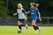 26 June 2023; Heather Payne, right, and Amber Barrett during a Republic of Ireland training session at UCD Bowl in Dublin. Photo by Brendan Moran/Sportsfile