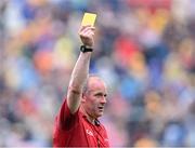 24 June 2023; Referee Johnny Murphy shows a yellow card during the GAA Hurling All-Ireland Senior Championship Quarter Final match between Clare and Dublin at TUS Gaelic Grounds in Limerick. Photo by Piaras Ó Mídheach/Sportsfile