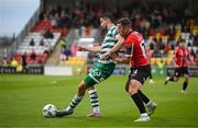 26 June 2023; Neil Farrugia of Shamrock Rovers in action against Ben Doherty of Derry City during the SSE Airtricity Men's Premier Division match between Shamrock Rovers and Derry City at Tallaght Stadium in Dublin. Photo by Stephen McCarthy/Sportsfile