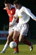 25 June 2004; Ollie Cahill, Shelbourne, in action against Keith Dunne, St. Patrick's Athletic. eircom league, Premier Division, St. Patrick's Athletic v Shelbourne, Richmond Park, Dublin.  Picture credit; David Maher / SPORTSFILE
