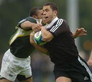23 June 2004; Glen Horton, New Zealand, in action against Bryan Habana, South Africa. IRB Under 21 World Rugby Championship, Semi-Final, New Zealand v South Africa, Hughenden, Glasgow, Scotland. Picture credit; Brian Lawless / SPORTSFILE