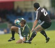 23 June 2004; Ruan Pienaar, South Africa, in action against Piri Weepu, New Zealand. IRB Under 21 World Rugby Championship, Semi-Final, New Zealand v South Africa, Hughenden, Glasgow, Scotland. Picture credit; Brian Lawless / SPORTSFILE