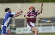 19 June 2004; Brian Connaughton, Westmeath, in action against Joe Fitzpatrick, Laois. Guinness All-Ireland Hurling Championship Qualifier, Laois v Westmeath, O'Moore Park, Portlaoise, Co. Laois. Picture credit; Damien Eagers / SPORTSFILE