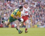20 June 2004; Damien Diver, Donegal, in action against Mark Harte, Tyrone. Bank of Ireland Ulster Senior Football Championship Semi-Final, Donegal v Tyrone, St. Tighernach's Park, Clones, Co. Monaghan. Picture credit; Damien Eagers / SPORTSFILE
