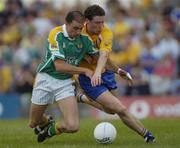 26 June 2004; Stephen Lohan, Roscommon, in action against Declan Maxmell, Leitrim. Bank of Ireland Connacht Senior Football Championship Semi-Final Replay, Roscommon v Leitrim, Dr. Hyde Park, Co. Roscommon. Picture credit; Damien Eagers / SPORTSFILE