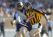 26 June 2004; D.J Carey, Kilkenny, in action against Stephen Perkins, Dublin. Guinness Senior Hurling Championship Qualifier, Round 1, Kilkenny v Dublin, Dr. Cullen Park, Co. Carlow. Picture credit; David Maher / SPORTSFILE