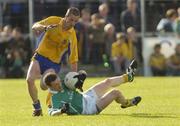 26 June 2004; Dermot Reynolds, Leitrim, in action against Nigel Dineen, Roscommon. Bank of Ireland Connacht Senior Football Championship Semi-Final Replay, Roscommon v Leitrim, Dr. Hyde Park, Co. Roscommon. Picture credit; Damien Eagers / SPORTSFILE