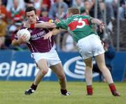 27 June 2004; Padraic Joyce, Galway, in action against David Heaney, Mayo. Bank of Ireland Connacht Senior Football Championship Semi-Final, Mayo v Galway, McHale Park, Castlebar, Co. Mayo. Picture credit; Damien Eagers / SPORTSFILE