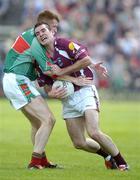 27 June 2004; Damien Burke, Galway, in action against Gary Mullins, Mayo. Bank of Ireland Connacht Senior Football Championship Semi-Final, Mayo v Galway, McHale Park, Castlebar, Co. Mayo. Picture credit; Damien Eagers / SPORTSFILE