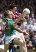 27 June 2004; Michael Meehan, Galway, in action against Gary Ruane, Mayo. Bank of Ireland Connacht Senior Football Championship Semi-Final, Mayo v Galway, McHale Park, Castlebar, Co. Mayo. Picture credit; Damien Eagers / SPORTSFILE
