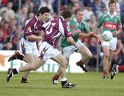 27 June 2004; Gary Ruane, Mayo, in action against Derek Savage, 13, and Michael Meehan, Galway. Bank of Ireland Connacht Senior Football Championship Semi-Final, Mayo v Galway, McHale Park, Castlebar, Co. Mayo. Picture credit; Damien Eagers / SPORTSFILE