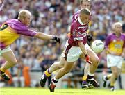 27 June 2004; Alan Mangan, Westmeath, in action against Willie Carley, Wexford. Bank of Ireland Leinster Senior Football Championship Semi-Final, Wexford v Westmeath, Croke Park, Dublin. Picture credit; David Maher / SPORTSFILE