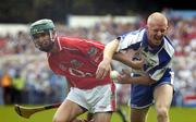 27 June 2004; John Mullane, Waterford, in action against Brian Murphy, Cork. Guinness Munster Senior Hurling Championship Final, Cork v Waterford, Semple Stadium, Thurles, Co. Tipperary. Picture credit; Pat Murphy / SPORTSFILE