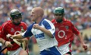 27 June 2004; John Mullane, Waterford, in action against Wayne Sherlock, left, and Brian Murphy, Cork. Guinness Munster Senior Hurling Championship Final, Cork v Waterford, Semple Stadium, Thurles, Co. Tipperary. Picture credit; Pat Murphy / SPORTSFILE