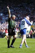 27 June 2004; John Mullane, Waterford, is shown the red card by referee Seanie McMahon. Guinness Munster Senior Hurling Championship Final, Cork v Waterford, Semple Stadium, Thurles, Co. Tipperary. Picture credit; Ray McManus / SPORTSFILE