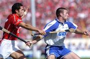 27 June 2004; Dan Shanahan, Waterford, in action against Sean Og O hAilpin, Cork. Guinness Munster Senior Hurling Championship Final, Cork v Waterford, Semple Stadium, Thurles, Co. Tipperary. Picture credit; Ray McManus / SPORTSFILE